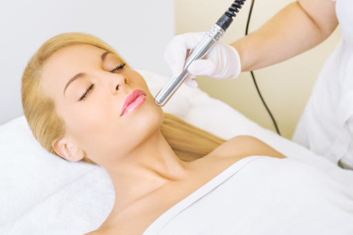 Young woman receiving massage - microdermabrasion
